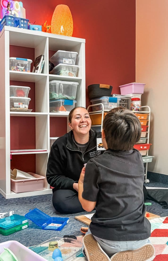Therapist and child during floor session